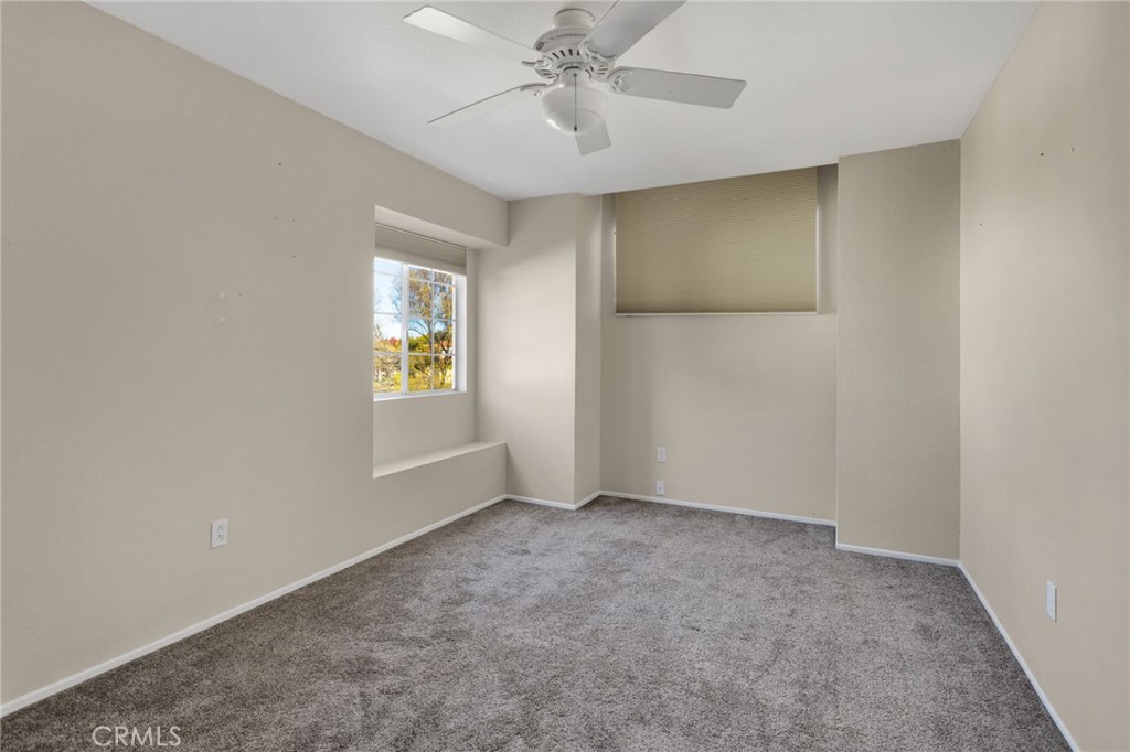 40243 Mimulus Way Temecula, CA 92591 - Photo 27 of 33 an empty room with windows and fan