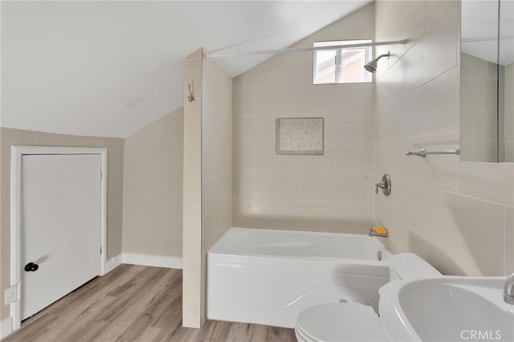 40243 Mimulus Way Temecula, CA 92591 - Photo 30 of 33 a bathroom with a bathtub shower sink vanity and toilet