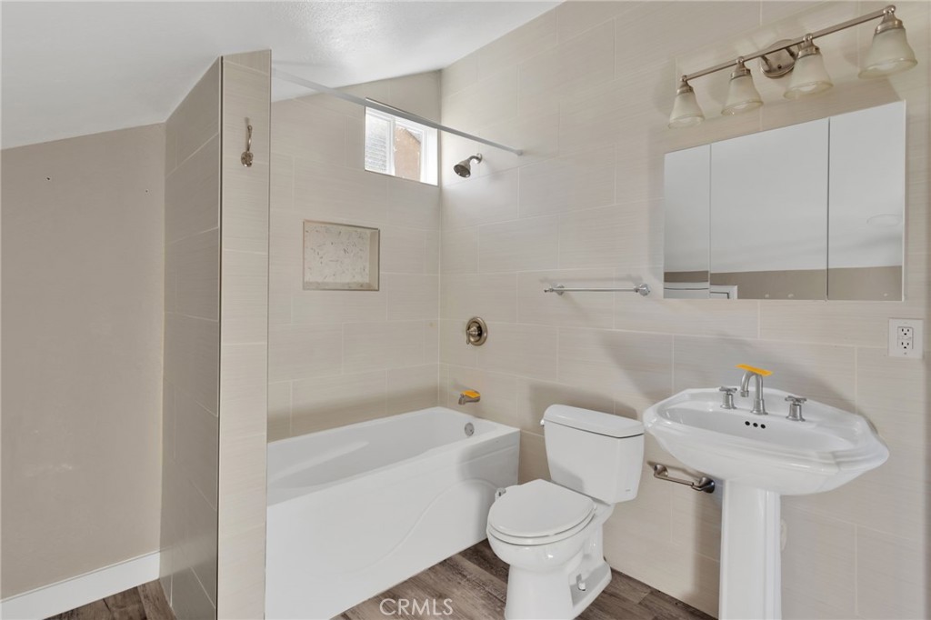 40243 Mimulus Way Temecula, CA 92591 - Photo 31 of 33 a bathroom with a sink toilet and shower