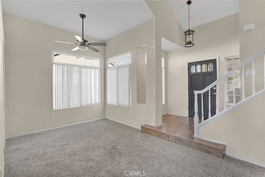 40243 Mimulus Way Temecula, CA 92591 - Photo 4 of 33 a view of an empty room with chandelier fan and window