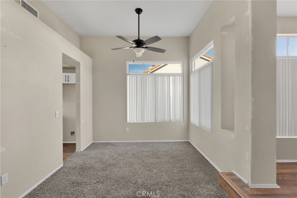 40243 Mimulus Way Temecula, CA 92591 - Photo 5 of 33 a view of empty room with window and ceiling fan