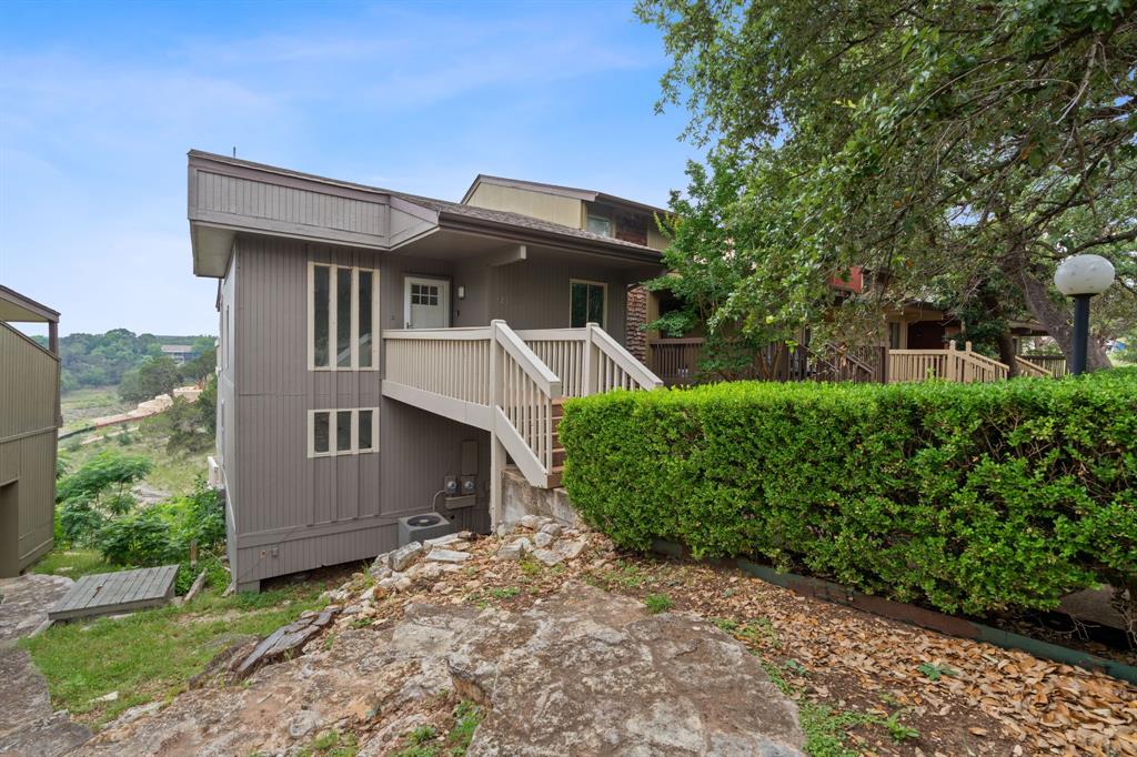 321 Venture Boulevard South Leander, TX 78645 - Photo 1 of 23 Rear view of property featuring stairway