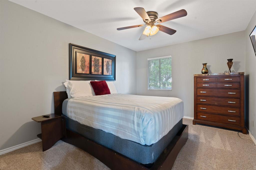 321 Venture Boulevard South Leander, TX 78645 - Photo 12 of 23 Bedroom featuring light colored carpet and ceiling fan