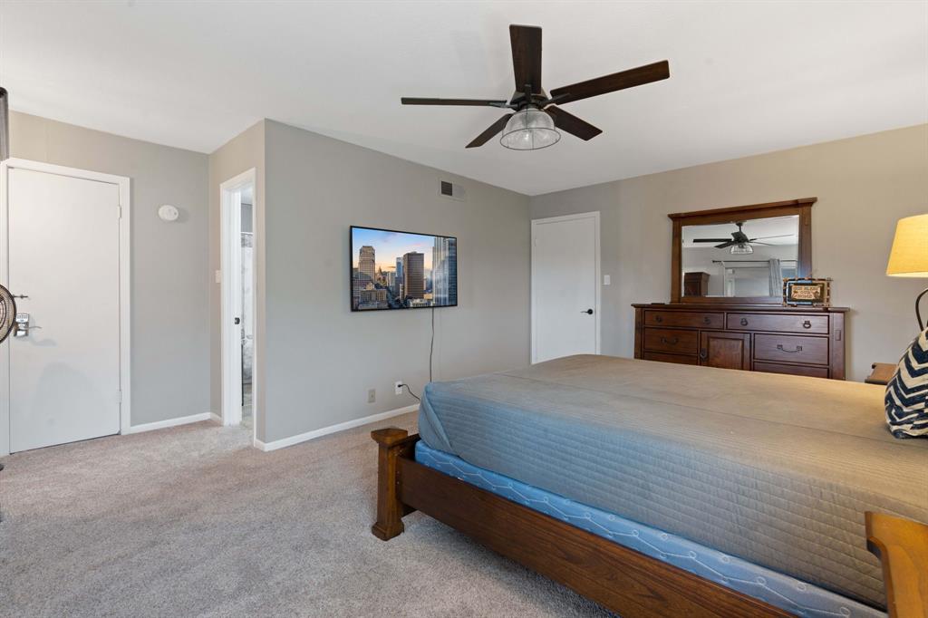 321 Venture Boulevard South Leander, TX 78645 - Photo 10 of 23 Bedroom featuring light carpet and ceiling fan
