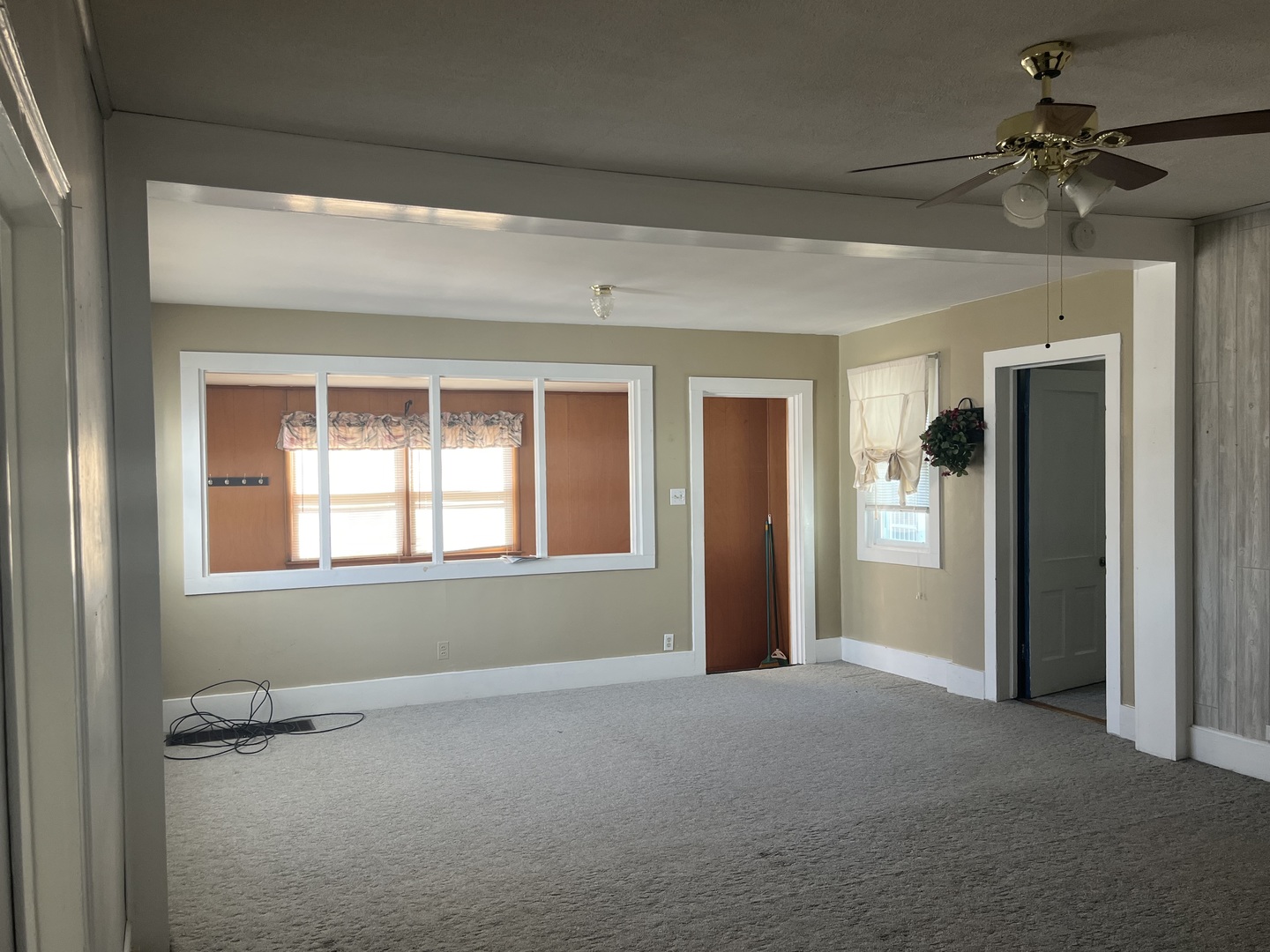 722 North 3rd Street Rochelle, IL 61068 - Photo 4 of 19 a view of an empty room with a window