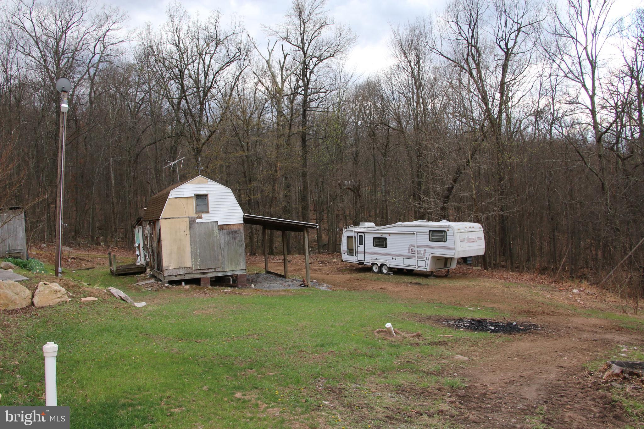 680 Sawlog Road Gore, VA 22637 - Photo 15 of 47 a view of a house with backyard