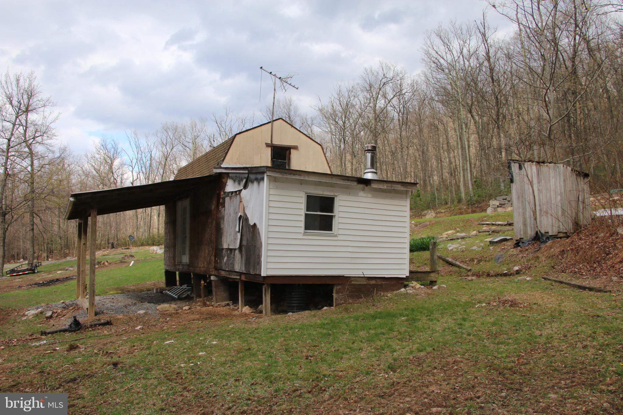 680 Sawlog Road Gore, VA 22637 - Photo 16 of 47 a view of a house with a yard