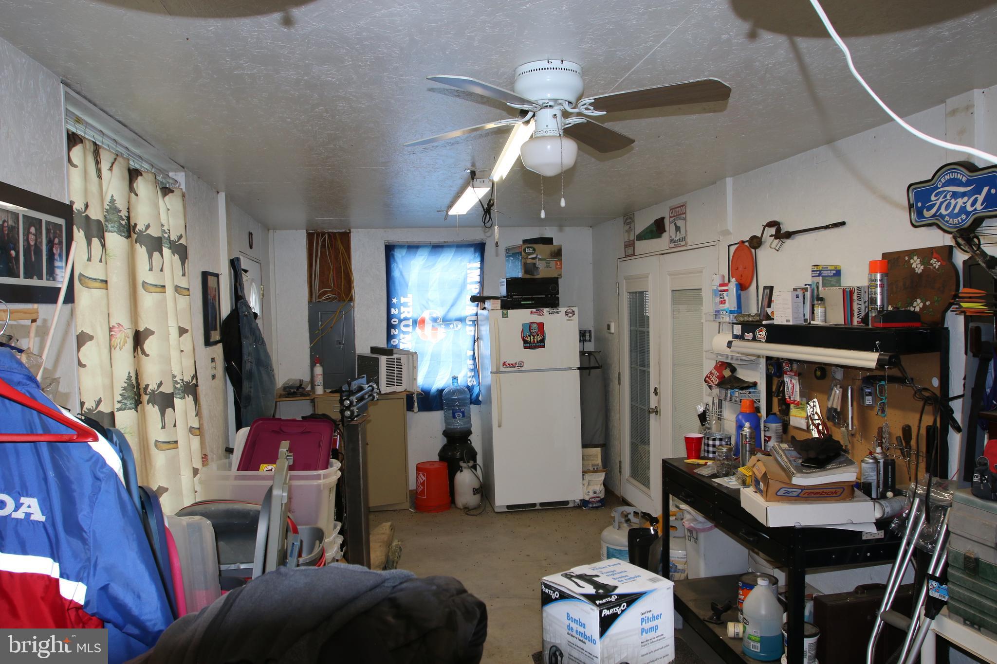 680 Sawlog Road Gore, VA 22637 - Photo 30 of 47 a view of a workspace with furniture and toys