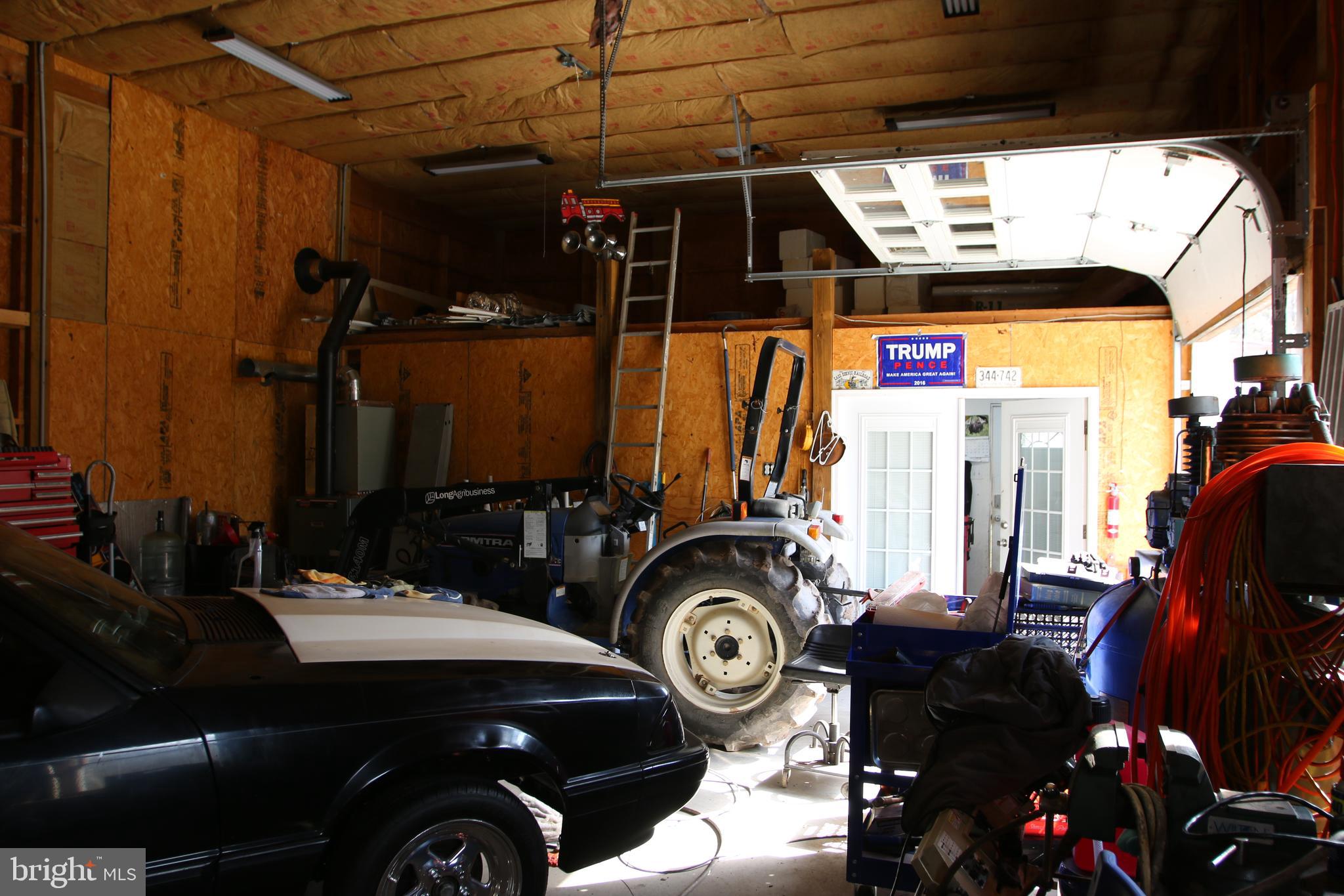 680 Sawlog Road Gore, VA 22637 - Photo 31 of 47 a view of car parked in garage