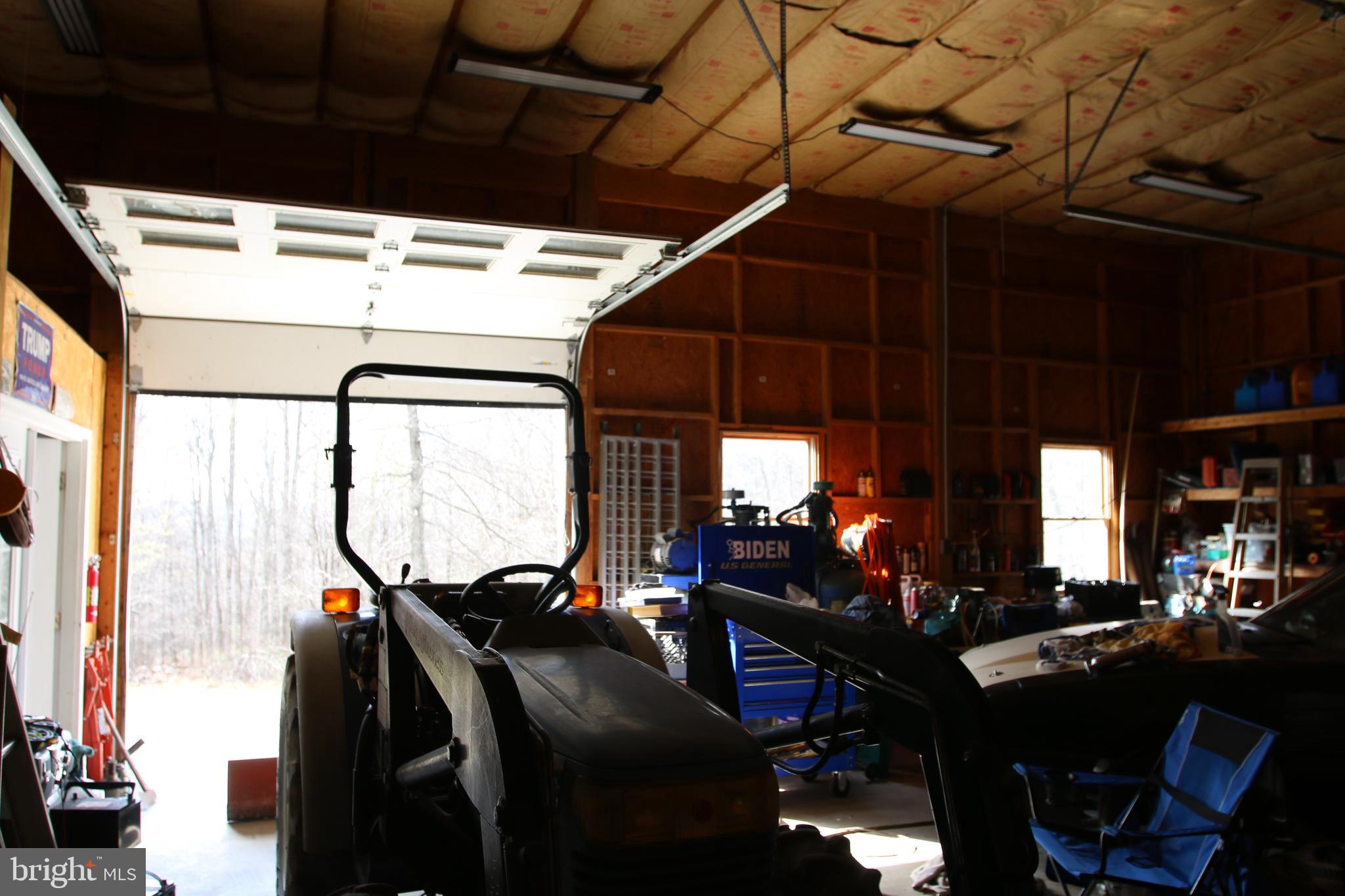 680 Sawlog Road Gore, VA 22637 - Photo 34 of 47 a view of a dining room with furniture and floor to ceiling window