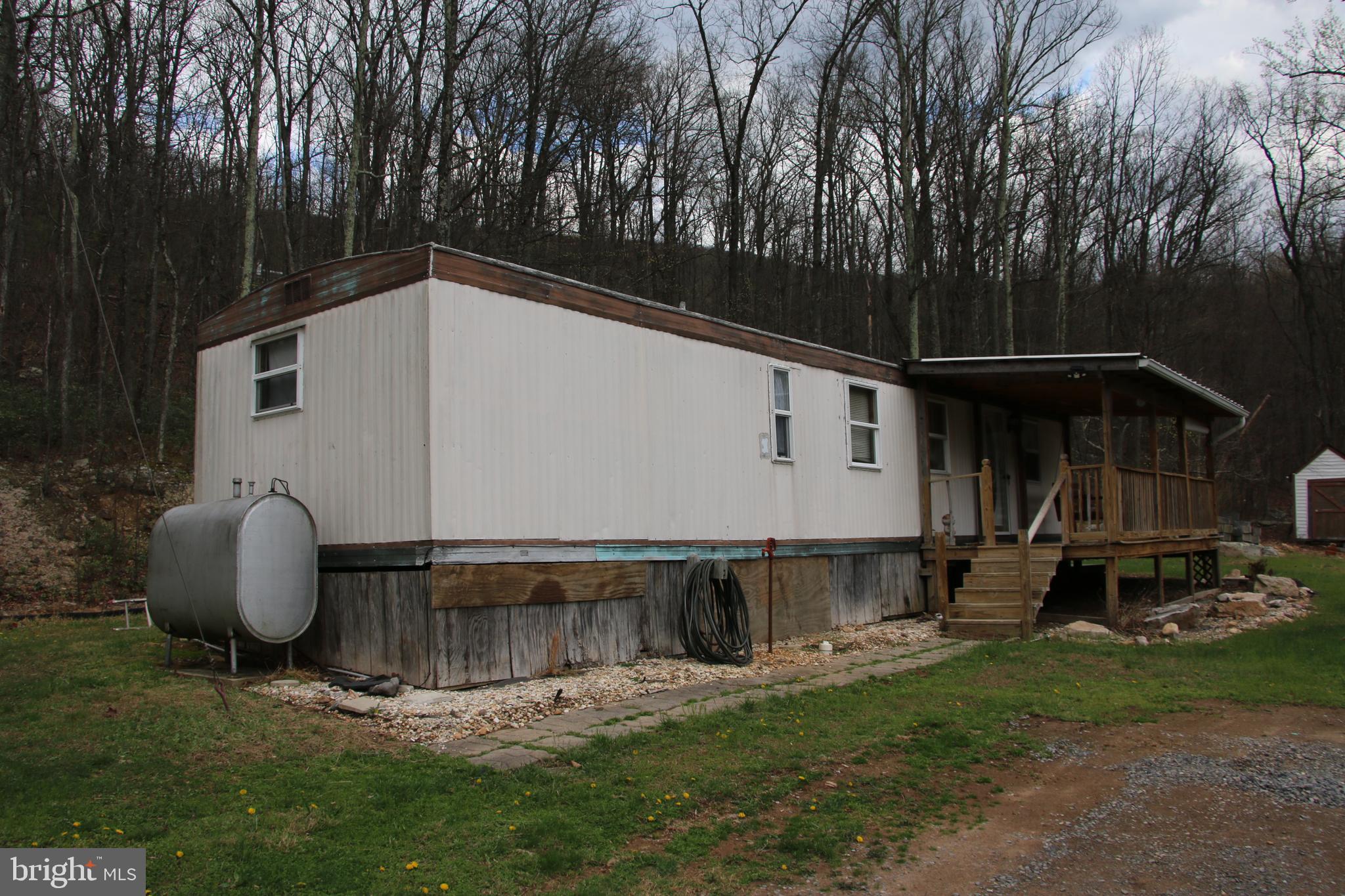 680 Sawlog Road Gore, VA 22637 - Photo 8 of 47 a view of a back yard of the house