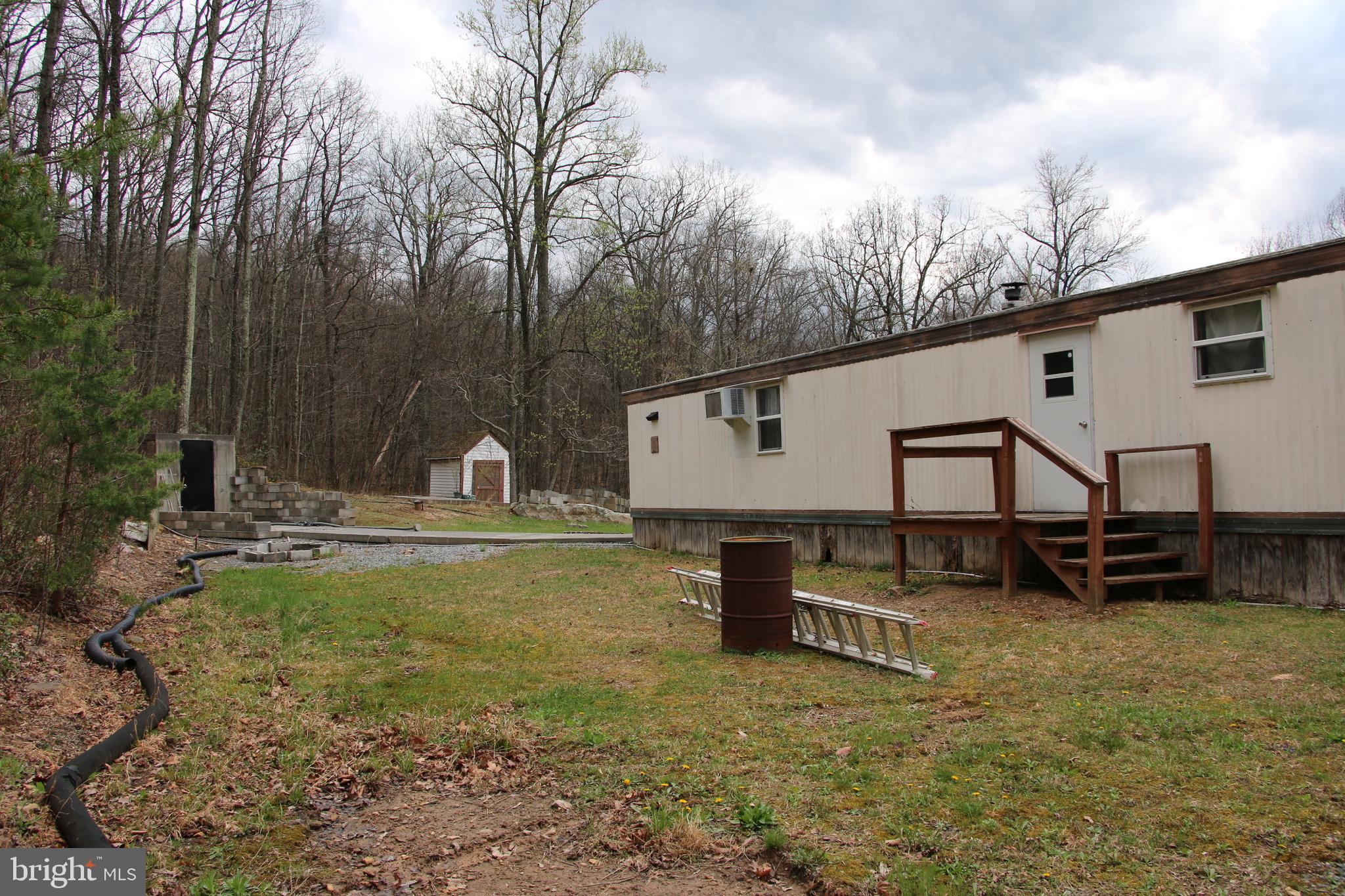 680 Sawlog Road Gore, VA 22637 - Photo 10 of 47 a view of a outdoor space with garden