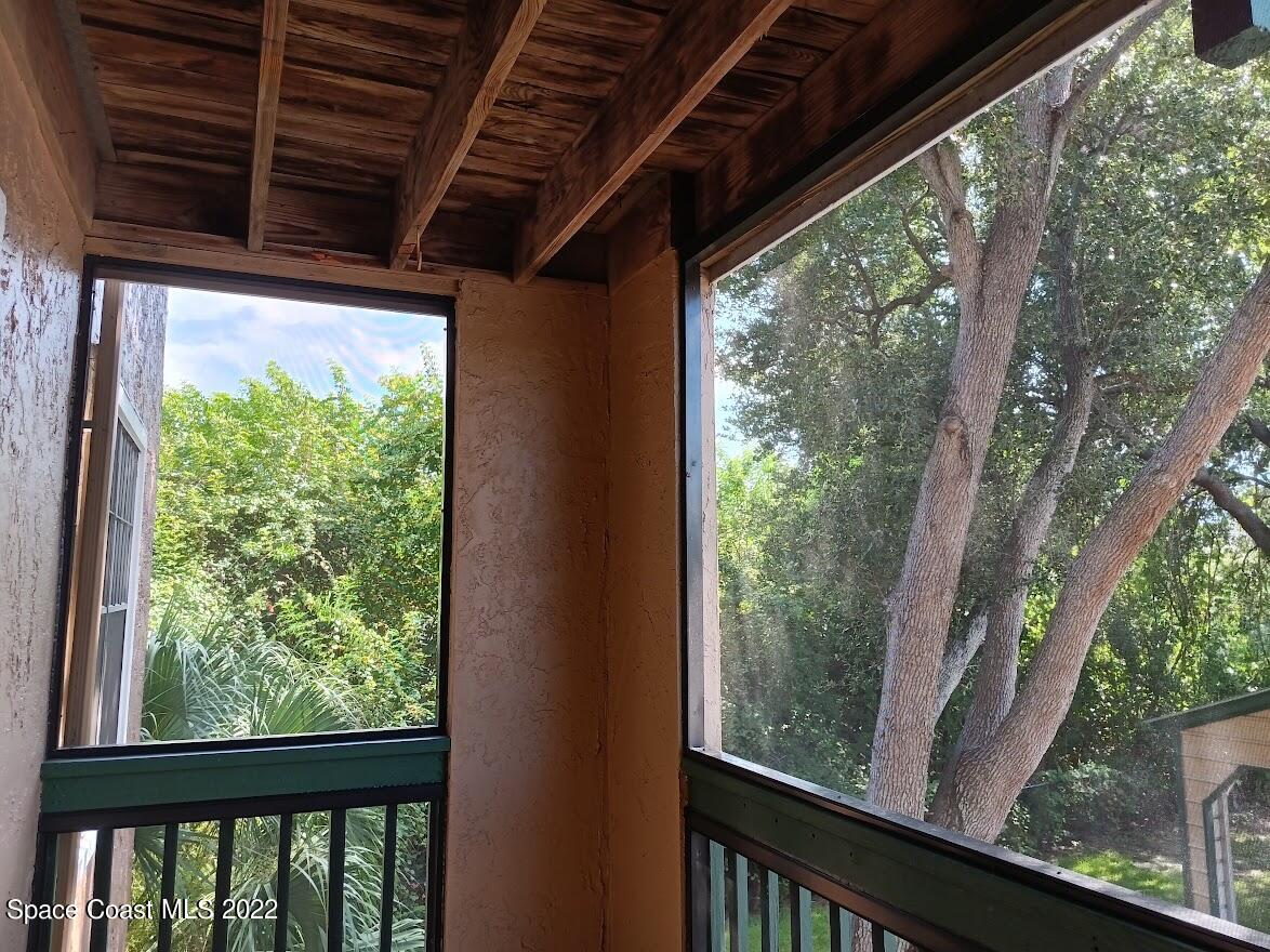 7667 North Wickham Road, Unit 715 Melbourne, FL 32940 - Photo 11 of 13 a view of a porch