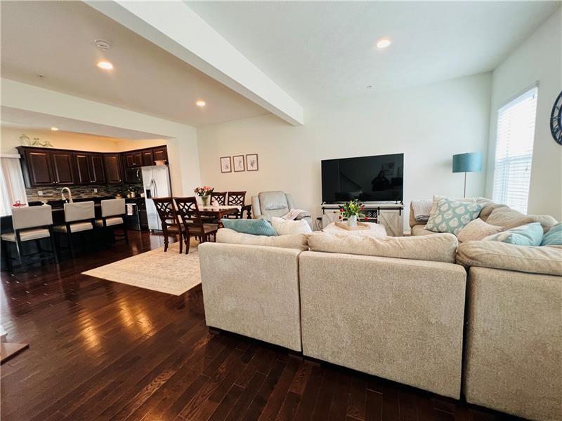 108 Watson Drive Warrendale, PA 15086 - Photo 16 of 31 a living room with furniture and a flat screen tv