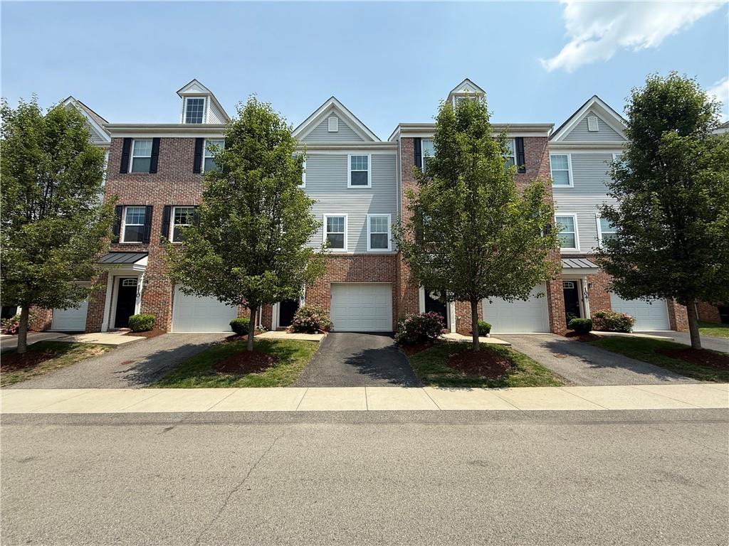 108 Watson Drive Warrendale, PA 15086 - Photo 2 of 31 a front view of house with yard and trees