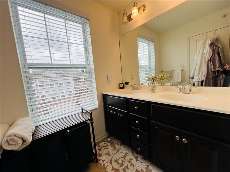 108 Watson Drive Warrendale, PA 15086 - Photo 22 of 31 a bathroom with a sink vanity and a mirror
