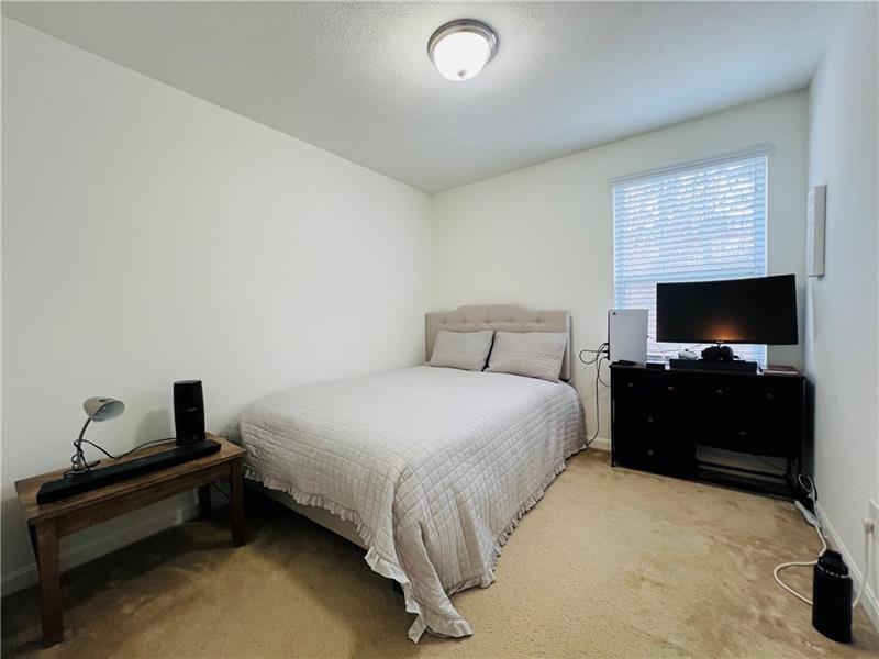 108 Watson Drive Warrendale, PA 15086 - Photo 23 of 31 a bedroom with a bed and a television