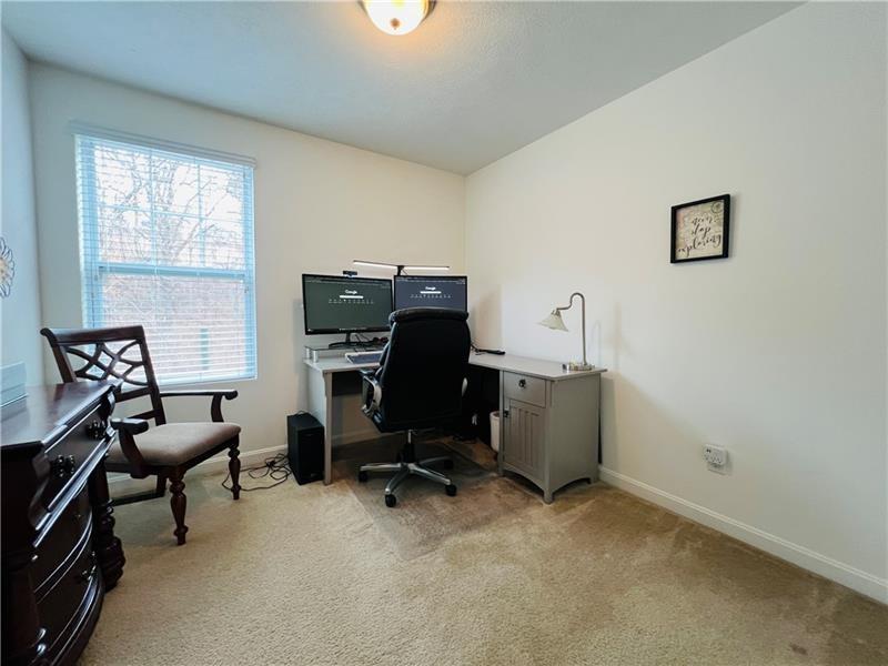 108 Watson Drive Warrendale, PA 15086 - Photo 27 of 31 a view of a workspace with furniture and a window