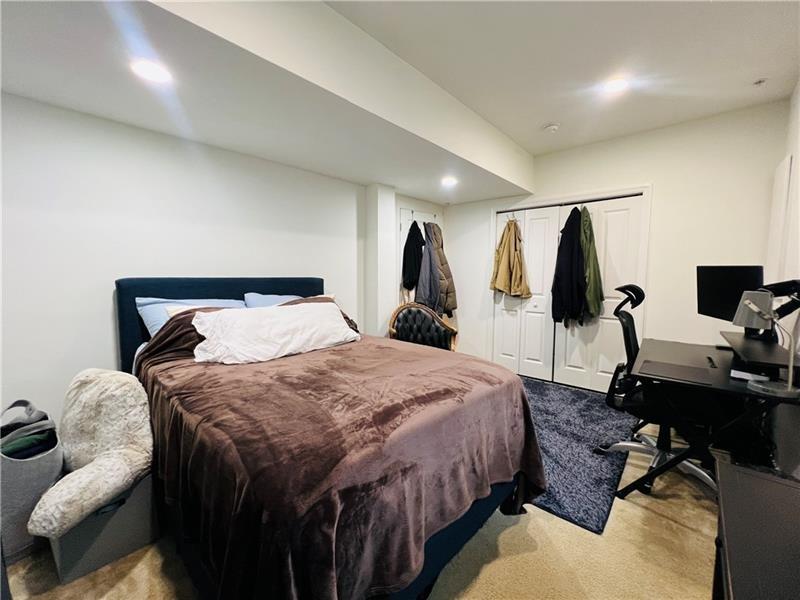 108 Watson Drive Warrendale, PA 15086 - Photo 5 of 31 a bedroom with a bed and a flat screen tv