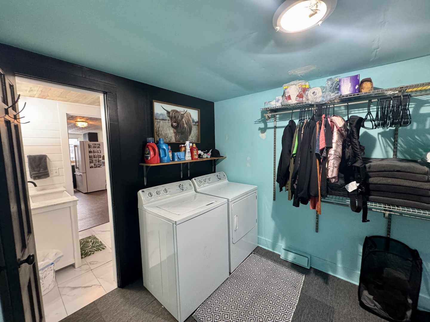 108 West Washington Street Dover, IL 61323 - Photo 23 of 28 a storage room with washer and dryer