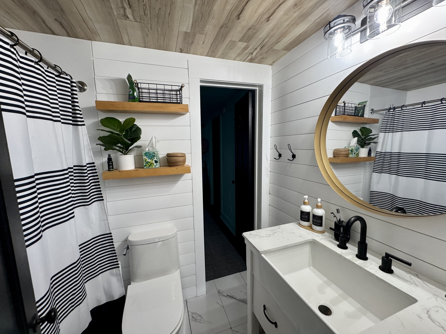 108 West Washington Street Dover, IL 61323 - Photo 25 of 28 a bathroom with a sink toilet and a mirror