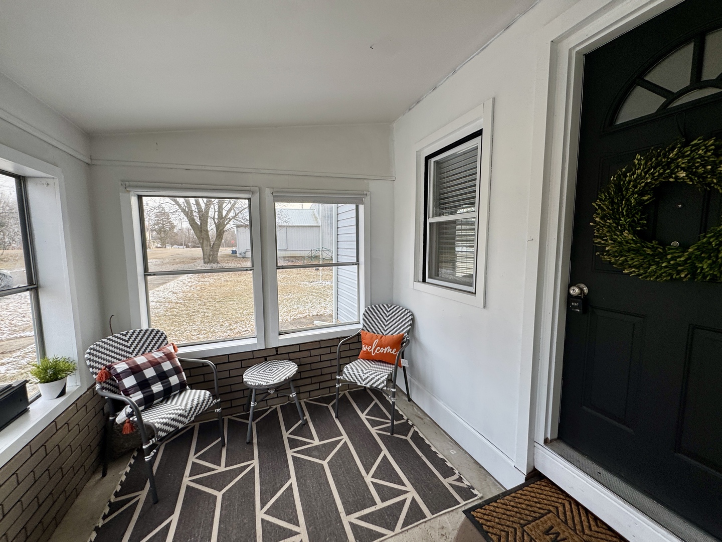 108 West Washington Street Dover, IL 61323 - Photo 4 of 28 a living room with furniture and a window