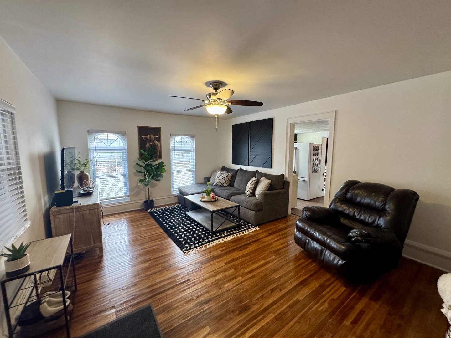 108 West Washington Street Dover, IL 61323 - Photo 6 of 28 a living room with furniture rug and wooden floor