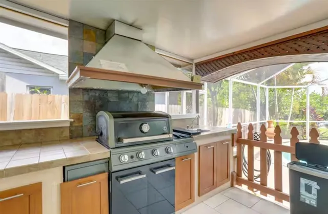 a kitchen with a stove and a microwave