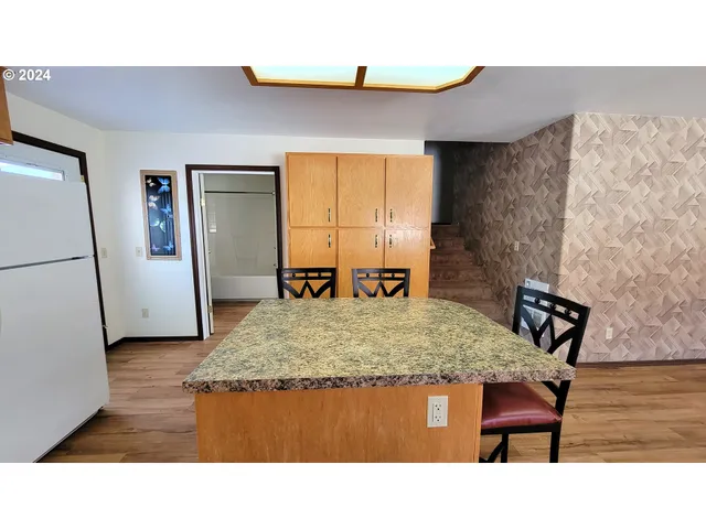 a en suite bathroom with a sink and a bathtub