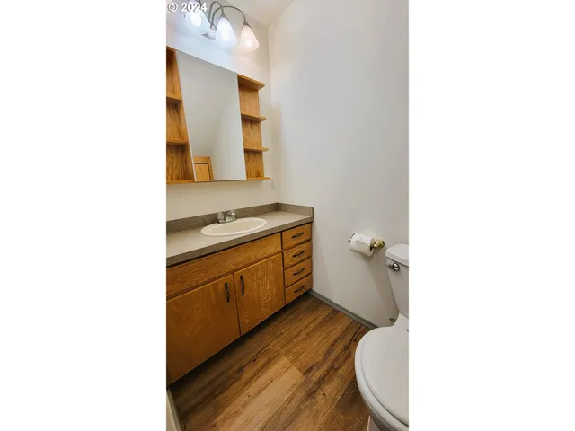 a black and white photo of a living room