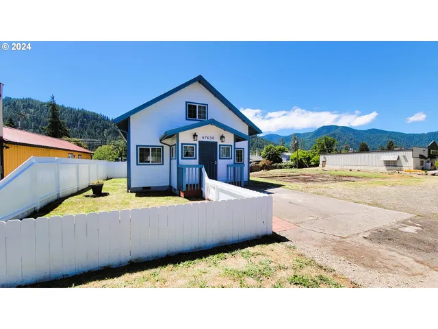 a view of a house with a swimming pool