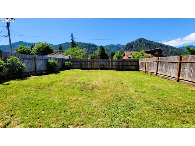 a bathroom with a sink and a large mirror