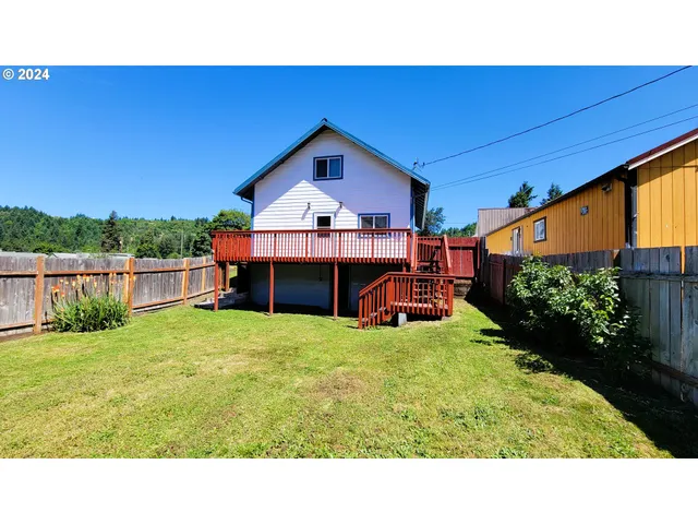 a bathroom with a sink and a yard