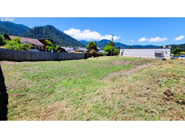 a bathroom with a sink mirror and window