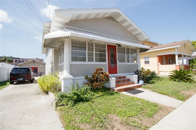 front view of a house with a yard