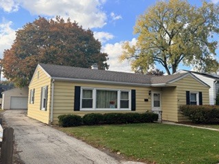 810 North Princeton Avenue Arlington Heights, IL 60004 - Photo 1 of 1 a view of a house with a backyard