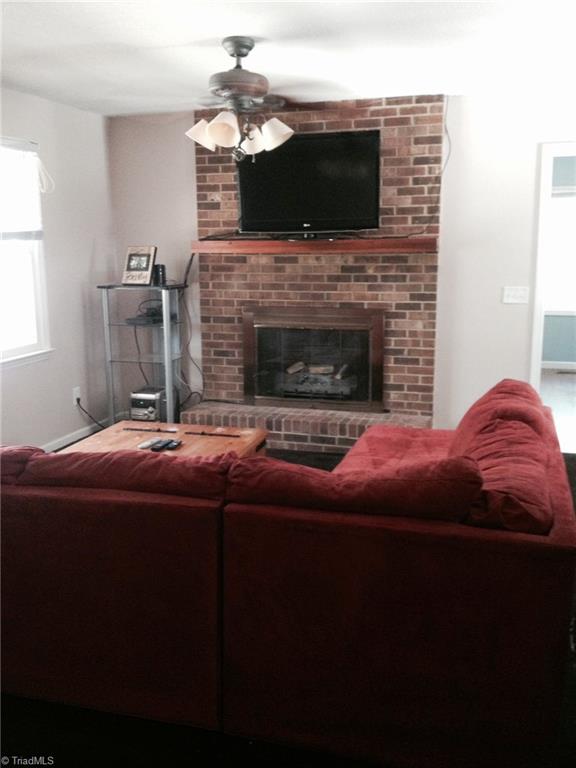 159 Hickory Tree Road Mocksville, NC 27028 - Photo 4 of 14 living room fireplace has gas logs