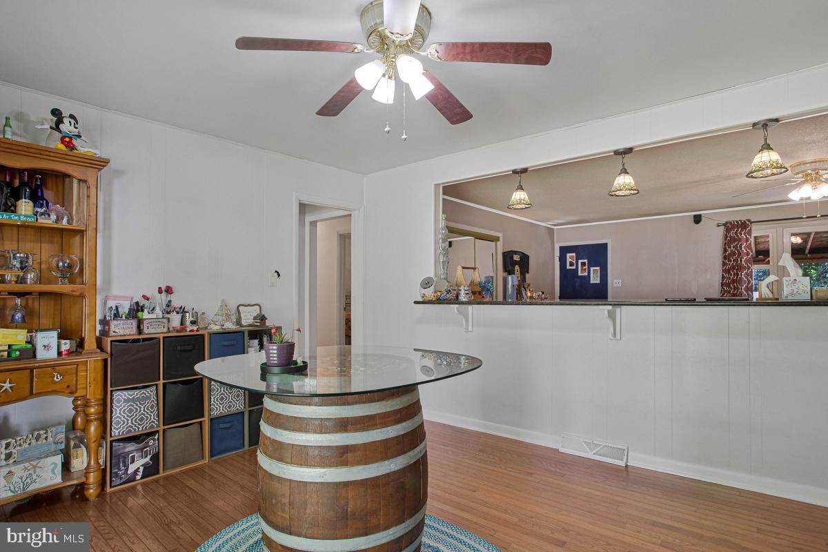 6600 Ashland Road La Plata, MD 20646 - Photo 6 of 40 a living room with furniture and a wooden floor
