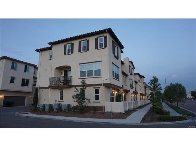 1613 East Lincoln Avenue Anaheim, CA 92805 - Photo 1 of 26 a black and white photo of a big house