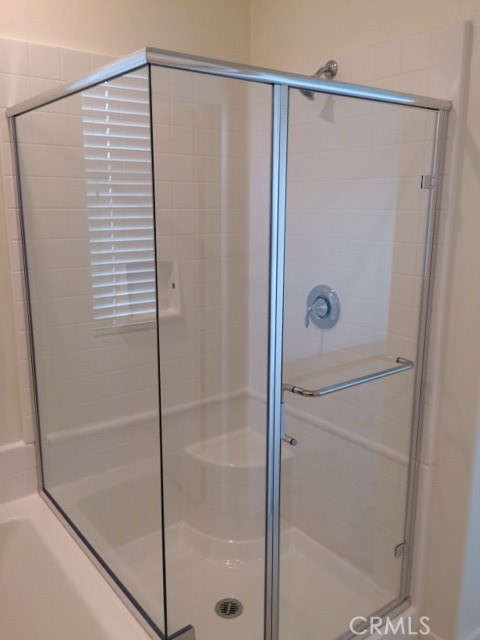 1613 East Lincoln Avenue Anaheim, CA 92805 - Photo 19 of 26 a bathroom with a shower