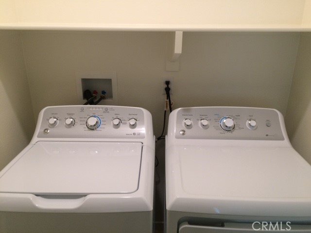 1613 East Lincoln Avenue Anaheim, CA 92805 - Photo 20 of 26 a utility room with dryer and washer