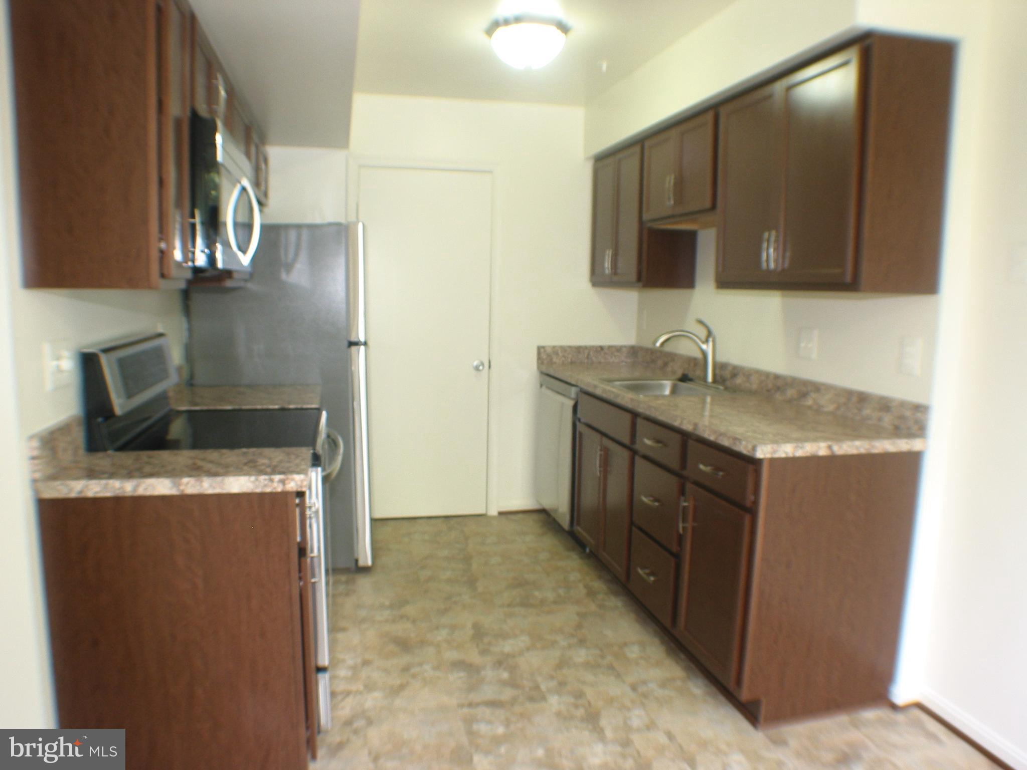 14905 Cleese Court, Unit E Silver Spring, MD 20906 - Photo 9 of 18 Kitchen