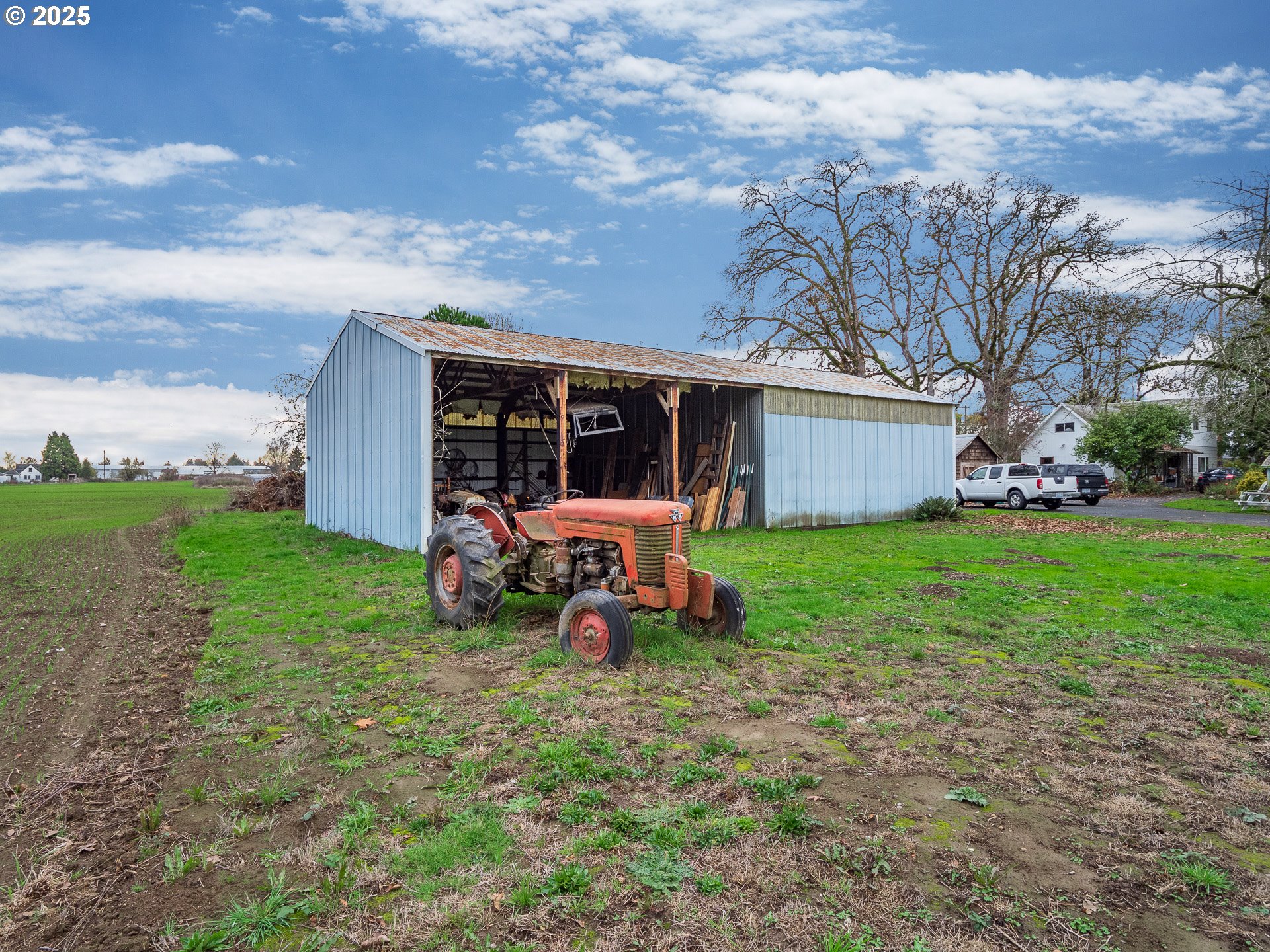 3312 East Fernwood Road Newberg, OR 97132 - Photo 14 of 23 a view of a house with backyard porch and garden