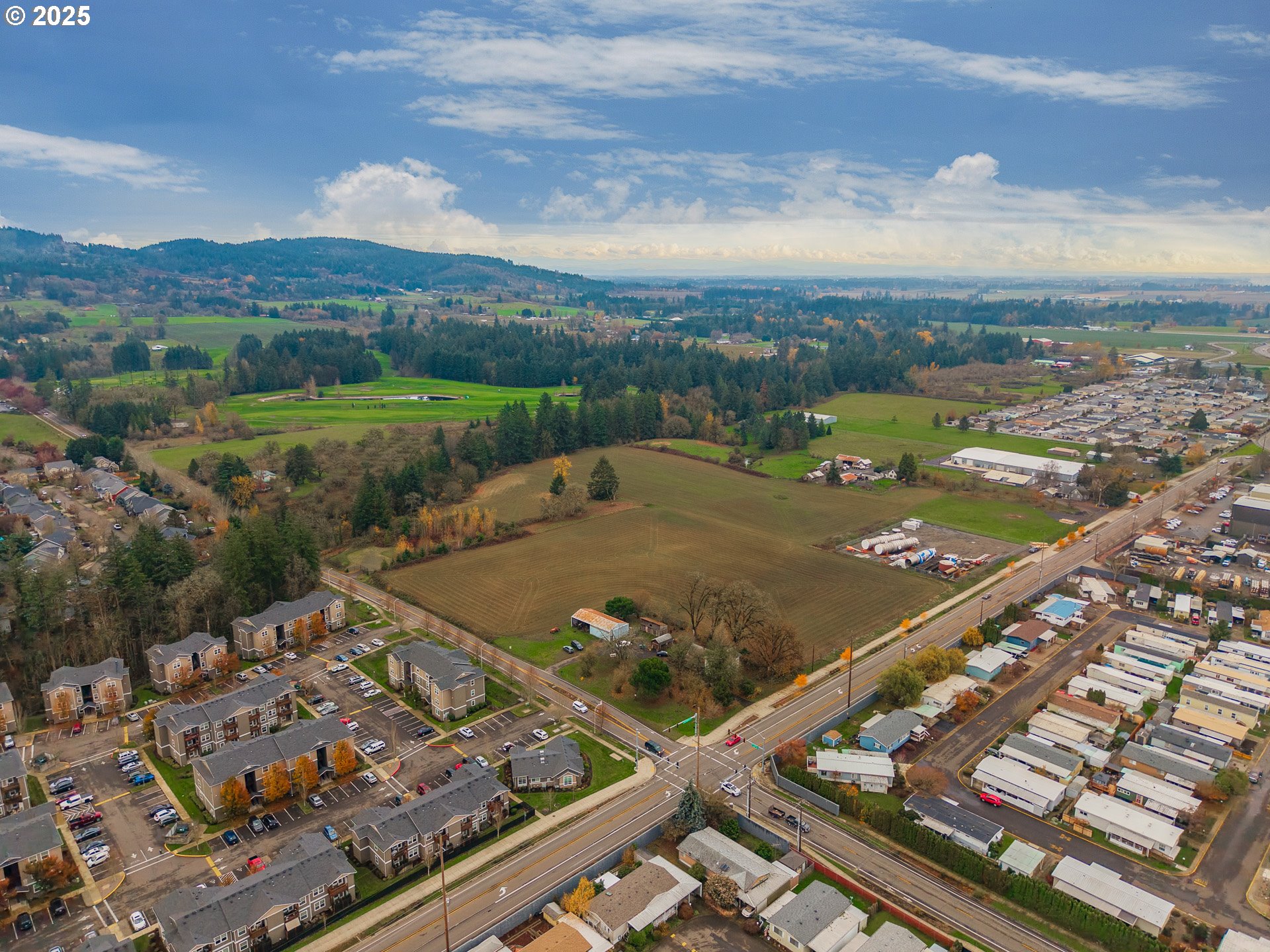 3312 East Fernwood Road Newberg, OR 97132 - Photo 6 of 23 an aerial view of a city