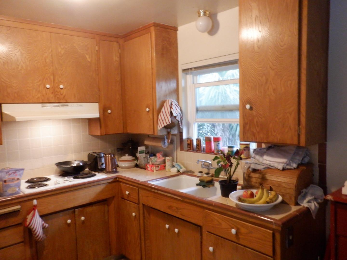 520 Chestnut Street Santa Cruz, CA 95060 - Photo 14 of 14 a kitchen with a sink and cabinets