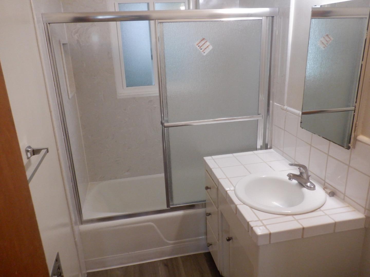 520 Chestnut Street Santa Cruz, CA 95060 - Photo 8 of 14 a bathroom with a sink and mirror