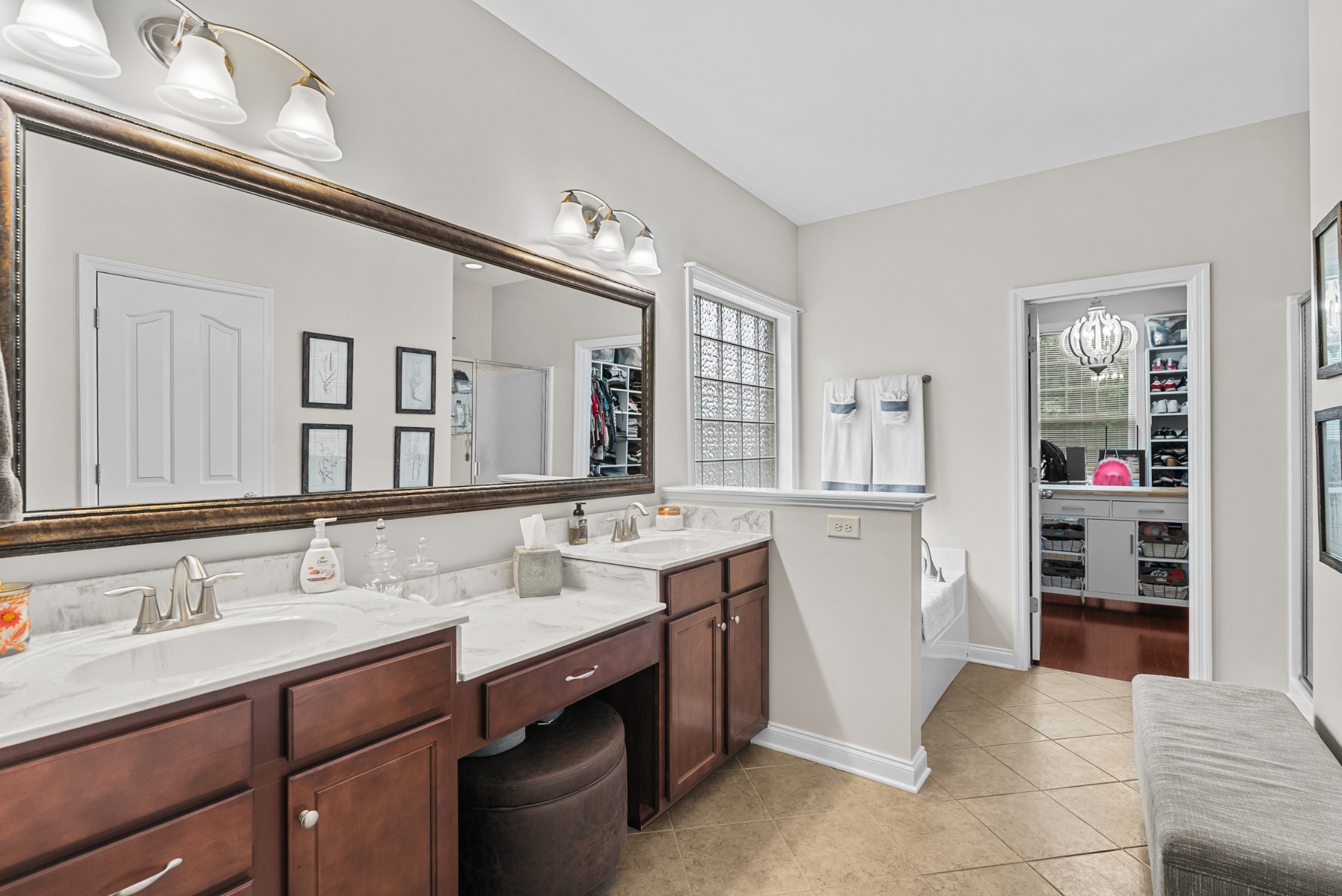 413 Marlowe Court Nolensville, TN 37135 - Photo 19 of 37 a spacious bathroom with a sink double vanity and a mirror