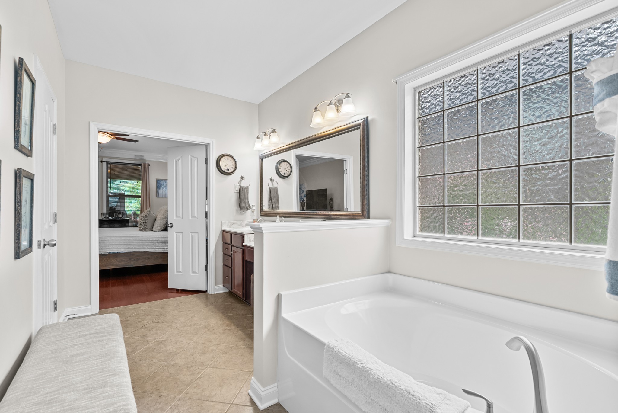 413 Marlowe Court Nolensville, TN 37135 - Photo 20 of 37 a en suite spacious bathroom with a tub sink and mirror