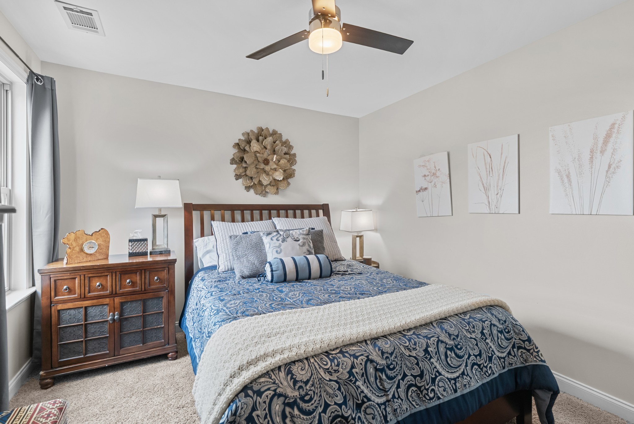 413 Marlowe Court Nolensville, TN 37135 - Photo 25 of 37 a bedroom with a bed and a chandelier