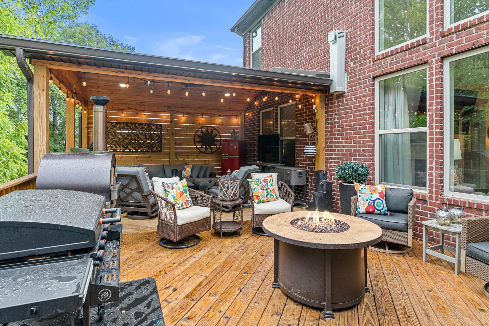 413 Marlowe Court Nolensville, TN 37135 - Photo 29 of 37 a view of a patio with table and chairs and potted plants